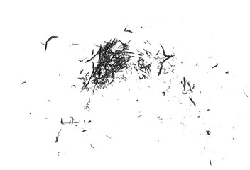 Black eraser scrap on a white background, top view.