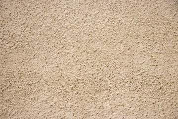 Beige painted grunge wall rough texture