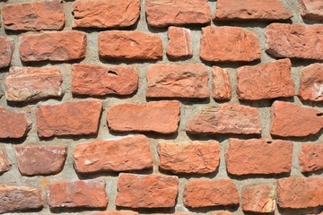 Verfugte Hausmauer aus behauenen Sandstein-Quadern