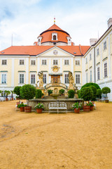 Fototapeta premium View of beautiful castle Vranov nad Dyji, Moravian region in Czech republic. Ancient chateau built in baroque style, placed on big rock above river near the Vranov village. Cloudy weather.