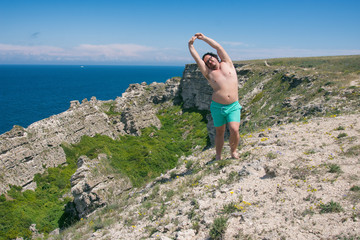 Sport and healthy lifestyle. Funny fat man and fitness.