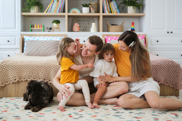 happy family and dog, child with Down syndrome