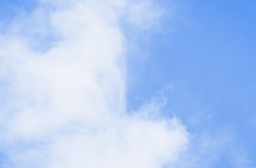 Beautiful white soft fluffy cirrocumulus clouds on a blue sky background