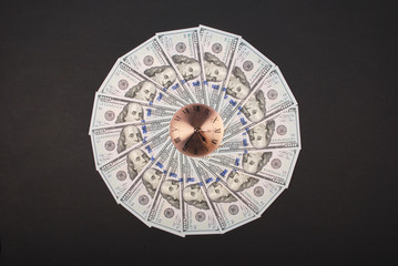 Concept of clock and dollar. Clock on mandala kaleidoscope from money. Abstract money background...