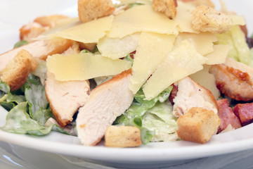 Close View of Caesar Salad in a White Plate