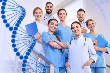 Group of doctors at clinic and DNA formula. Medical service