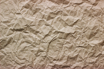 Crumpled old paper texture. Kraft paper. High detailed abstract packaging paper texture.