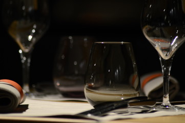 Diner table server with wine glasses with wine and food
