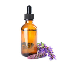 Obraz na płótnie Canvas Bottle of sage essential oil and flowers isolated on white