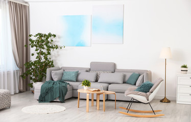 Modern living room interior with comfortable sofa
