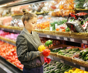 Woman buying vegetables at the market