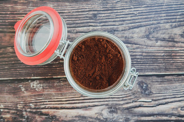 coffee in a glass jar on a dark table