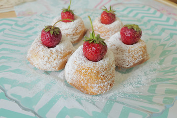 Mini Cakes with Strawberries isolated on a Colorful Background