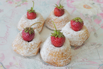 MIni Cakes with Strawberries isolated on a Colorful Background