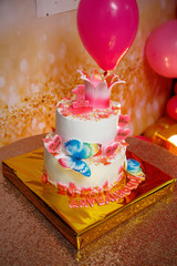 Sweet beautiful cake and other sweets for a child's birthday