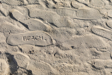 Plakat Sandal mark in sand