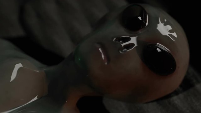 creepy alien in bed slowly moving head