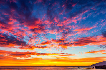 Fototapeta na wymiar High Clouds at Sunset over Ocean
