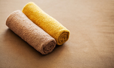 Chocolate Spa . Composition brown towel in hotel room of spa treatment