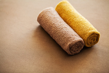 Chocolate Spa . Composition brown towel in hotel room of spa treatment
