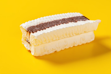 side view fresh chocolate and milkshake flavor popsicle on a yellow background