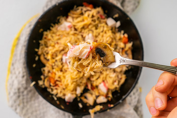 noodles in the pan with mushrooms aand cherry tomatoes, italian pasta cookings