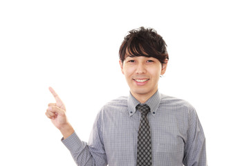 指示する笑顔のビジネスマン