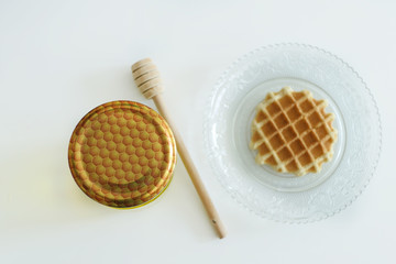 Waffle with Honey Jar isolated on a White Background