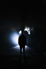 silhouette of a man in front of light