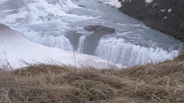 Slow motion shot of an impressive waterfall in Iceland.