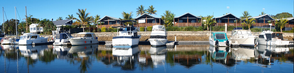 Naklejka premium Tropical Marina Accommodation Panorama. Tin Can Bay.