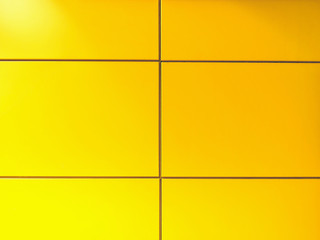 Full Frame Background of Vibrant Yellow Tiled Wall