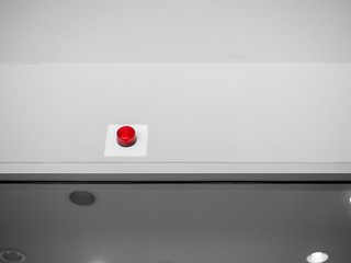 Emergency alarm siren on the white wall inside the building