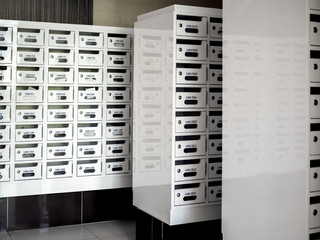 White post parcel mailboxes. Delivery locker letter boxes.