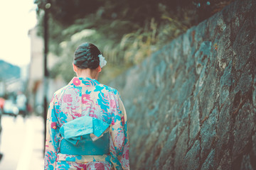 Woman dress up Japanese traditional Yukata on Kyoto street 