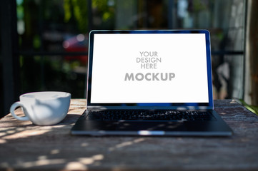 Mockup of business man using laptop screen for your advertising text message Laptop with blank...