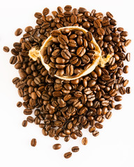 Coffee beans are packed in sacks that are placed on the coffee bean stack on a white background.