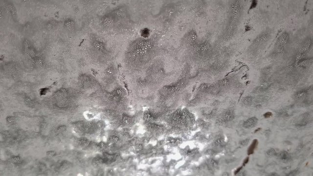 Car washing in a automatic machine tunnel