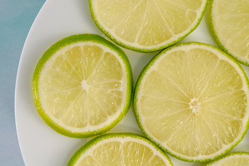 Lime Sliced on a Plate, Top View Close Up