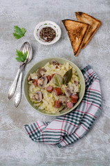 Stewed vegetables with sausages