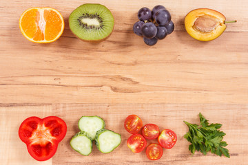 Frame of healthy nutritious fruits and vegetables as source minerals, vitamins and fiber, place for text