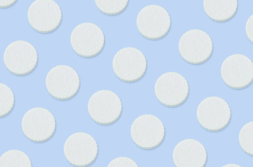 Creative art made with cookies pattern on pastel blue background