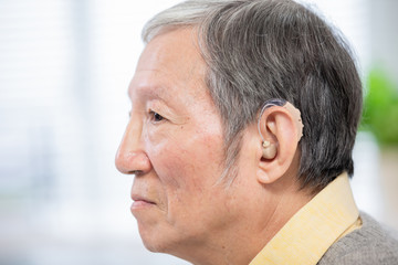 elder patient wear audiphone