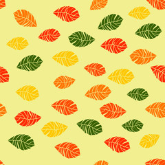 Seamless pattern of autumn colored leaves. Vector