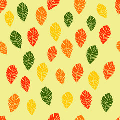 Seamless pattern of autumn colored leaves. Vector