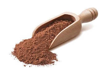 Wooden scoop with crude cocoa powder isoladed on white background