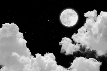 Full moon with starry and clouds background. Dark night.