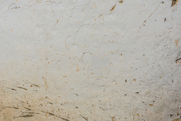 Texture, wall, concrete, it can be used as a background. Wall fragment with scratches and cracks