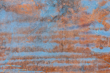 Metal texture with scratches and cracks which can be used as a background