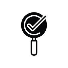 Black solid icon for magnifying glass with check mark